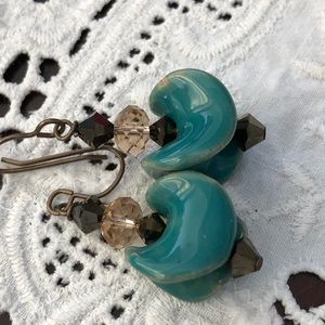 Unique turquoise ceramic and glass earrings.
